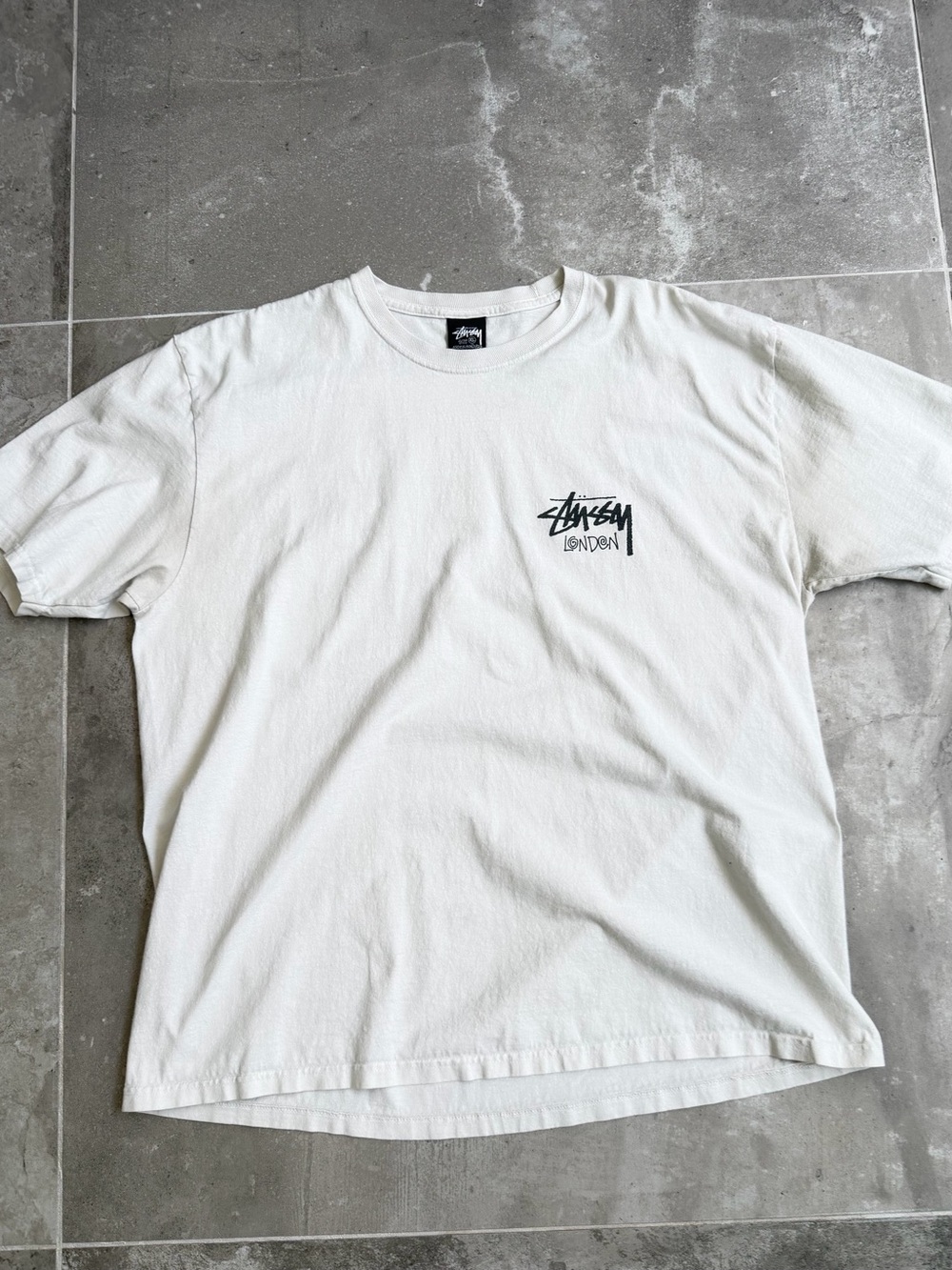 Stussy White Short Sleeve Tee with Black Chest Logo